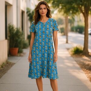 LuLaRoe Blue and Orange Patterned Carly Swing Dress